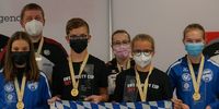 Foto: DSJ / Das siegreiche Team aus Bayern mit den Spitzenschützen Christian Reitz und Johanna Tripp (hinten).