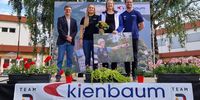 Foto: Trainingszentrum Kienbaum / Große Ehre für Lisa Unruh: Sie erhielt ein "Wohlfühlzimmer" und ist hier mit Olaf Tabor (Vorsitzender Leistungssport DOSB), Laudatorin Charline Schwarz und Martin Rieprecht (Geschäftsführer Kienbaum) zu sehen.