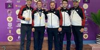 Foto: DSB / Das Pistolenteam mit weltmeisterlichem Glanz v.l.: Bundestrainer Detlef Glenz, Christian Reitz, Oliver Geis, Florian Peter, Co-Trainer Norbert Klaar.