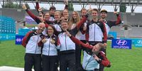 Foto: DSB / Das sehr erfolgreiche Recurve-Bogenteam feiert sich zurecht für die erzielten Ergebnisse.