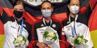 Foto: DSB / Wenn auch mit Mundschutz und Augen zu, sie sind es: Die neuen Team-Europameisterinnen v.l. Nadine Messerschmidt, Katrin Butterer und Christine Wenzel.